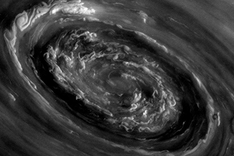 Thunderstorms on Saturn May Drive Epic Polar Cyclones